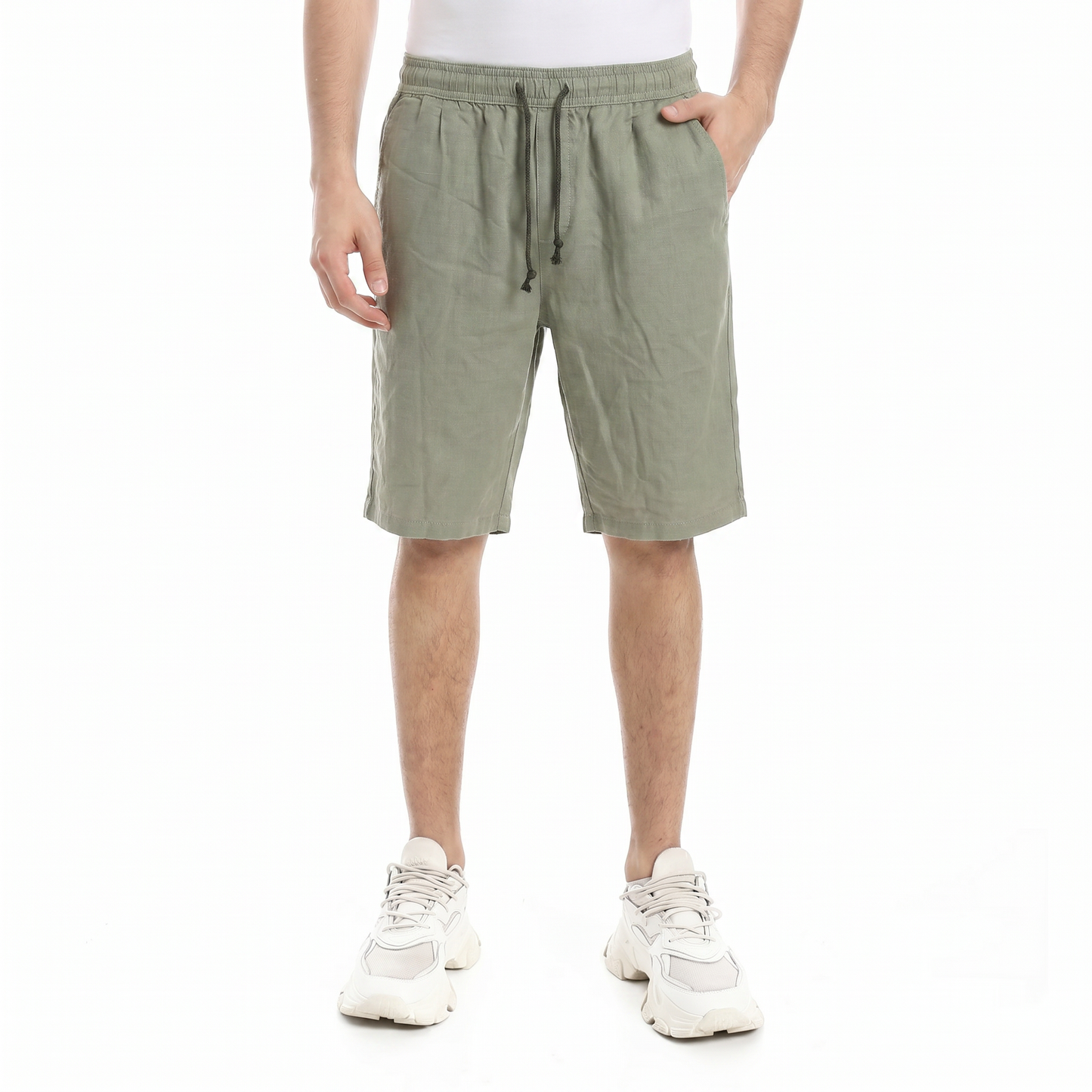 Men wearing relaxed fit linen shorts with elastic waistband and drawstring