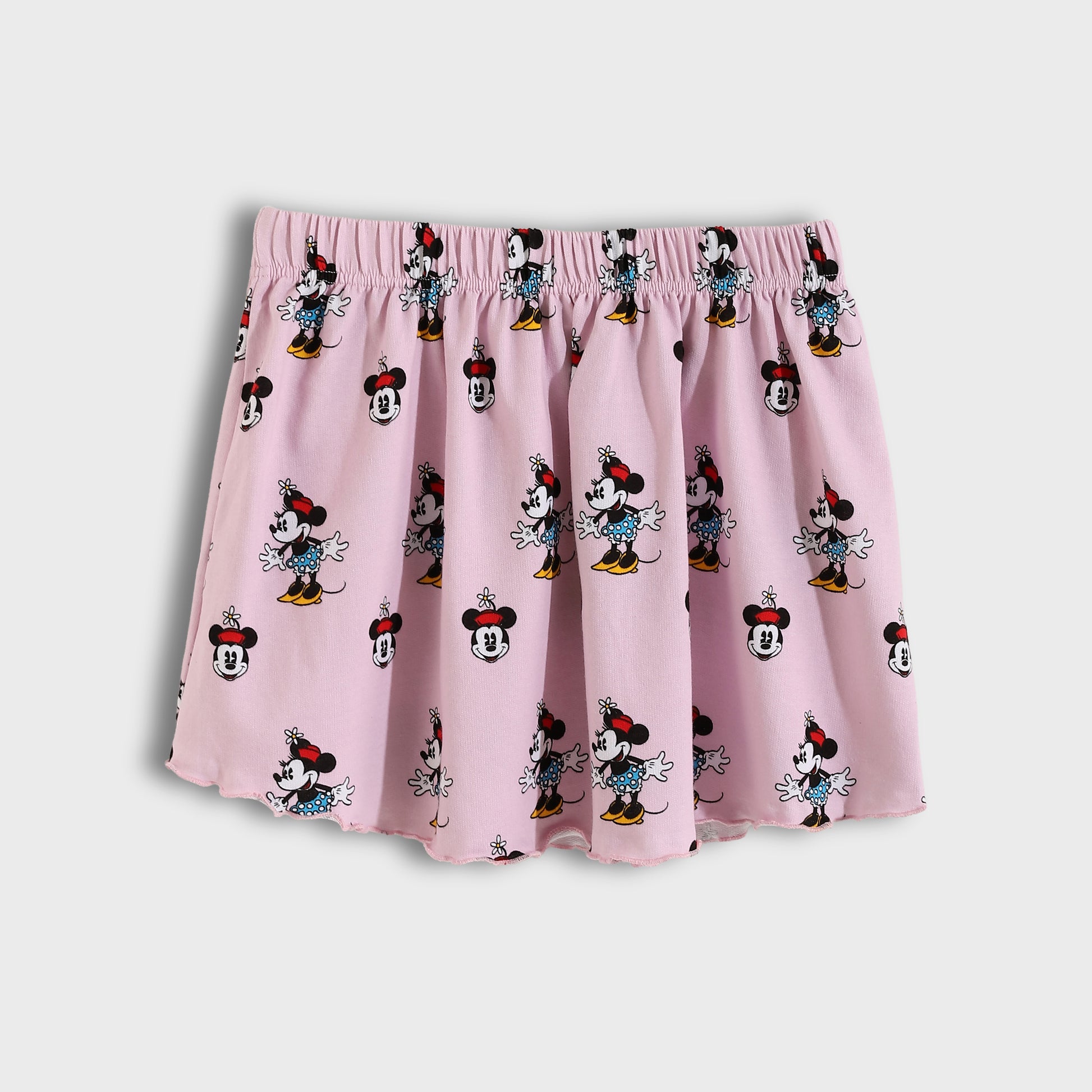 Pink skirt with Minnie Mouse pattern on a white background