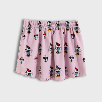 Pink skirt with Minnie Mouse pattern on a white background