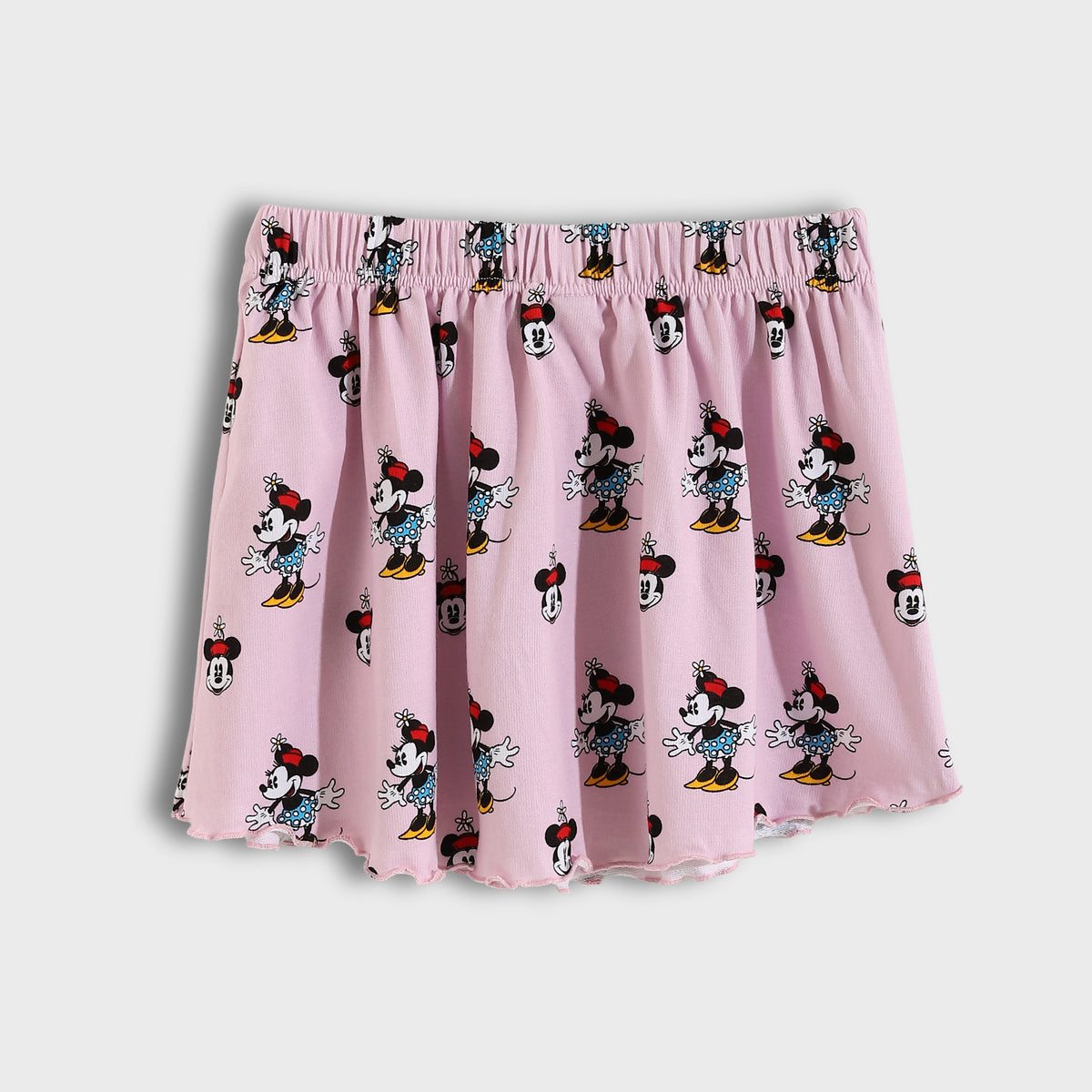 Pink shorts with Minnie Mouse pattern on a white background