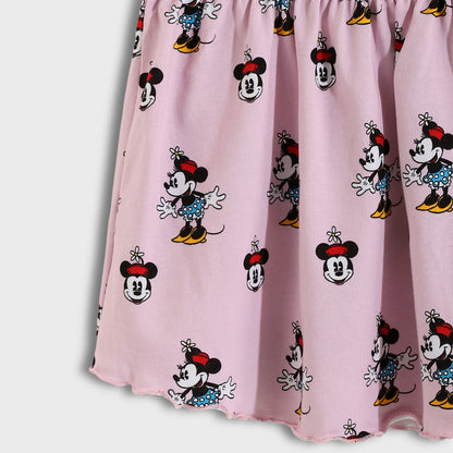 Pink curtain with Minnie Mouse pattern on a gray background