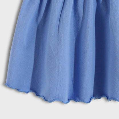 Close-up of a blue fabric with a plain background