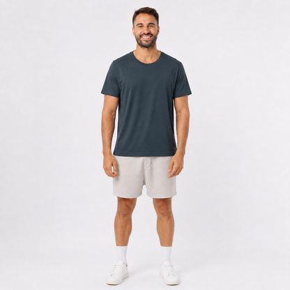 Man wearing a DARKGRAY plain polyester short-sleeve T-shirt, front view