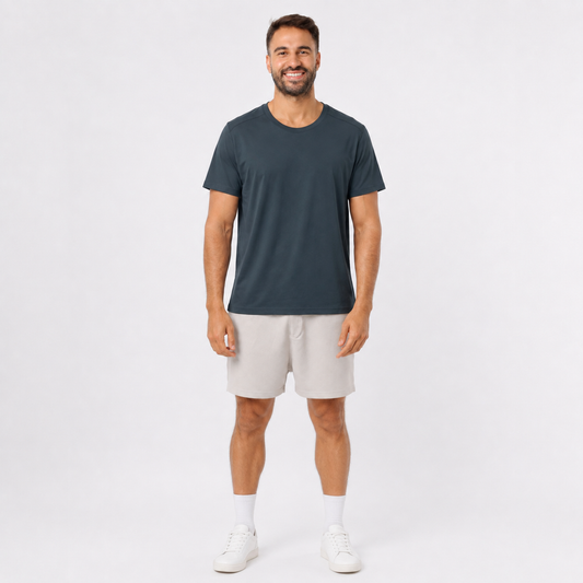 Man wearing a DARKGRAY plain polyester short-sleeve T-shirt, front view