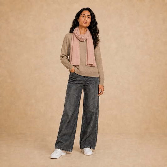 Model wearing women's plain knit scarf in cashmere