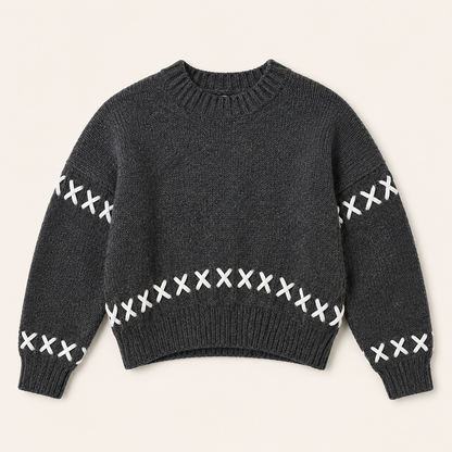 Women dark gray knit crew neck pullover with white cross-stitch detail flat lay