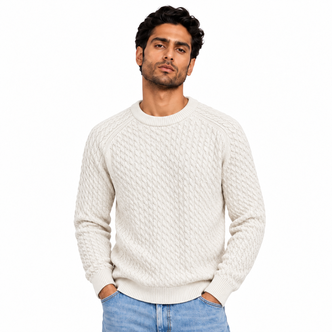 Man wearing Cable Knit Crew Neck Pullover in Cream - model photo