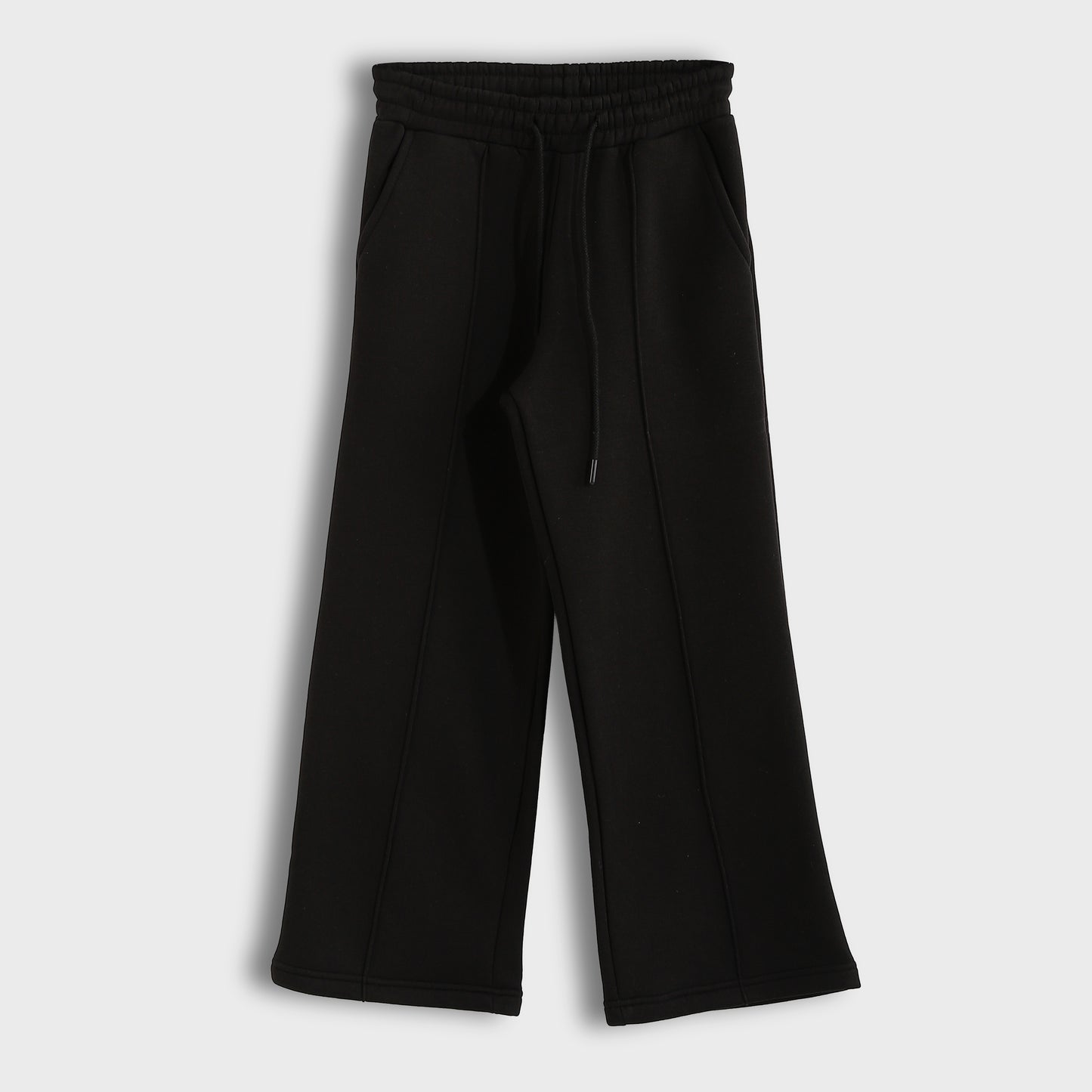 Black pants on a light gray background