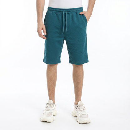 Men wearing plain melton shorts with elastic waistband and relaxed fit