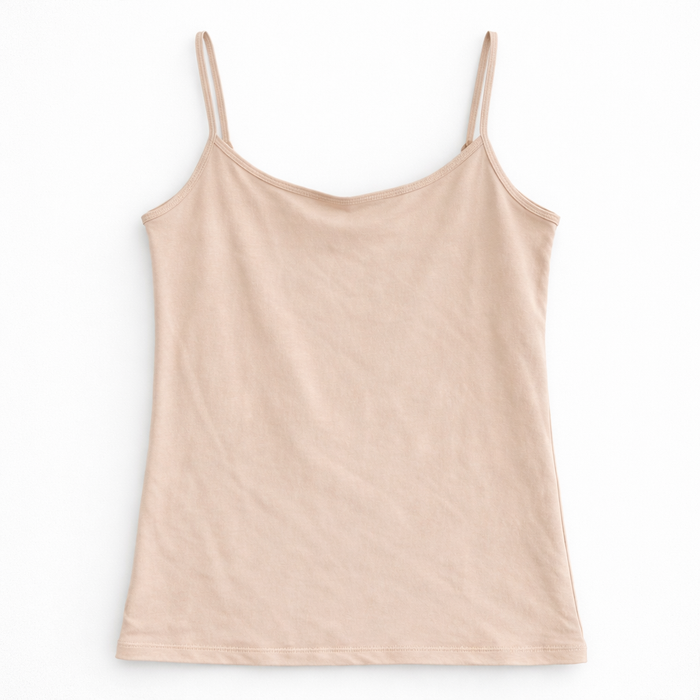 Coral camisole with thin straps on a white background