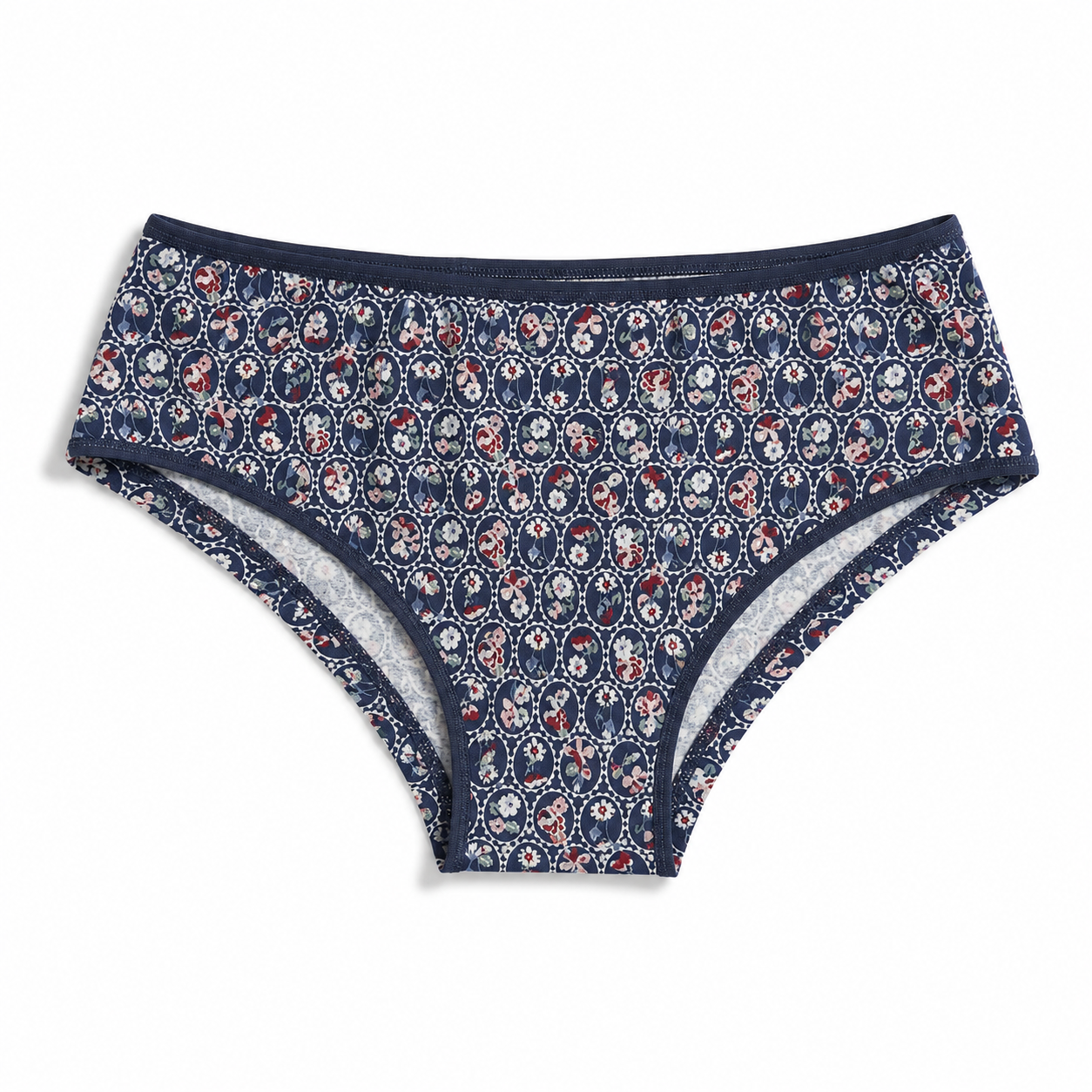 A pair of women's high-waisted briefs featuring a navy blue base with a dense, small-scale floral and paisley pattern in red, white, and light blue. The waistband and leg openings are solid navy blue.