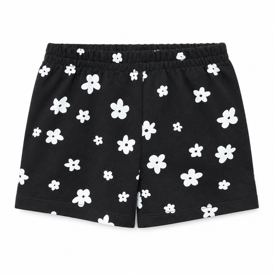 Black shorts with white floral pattern on a white background