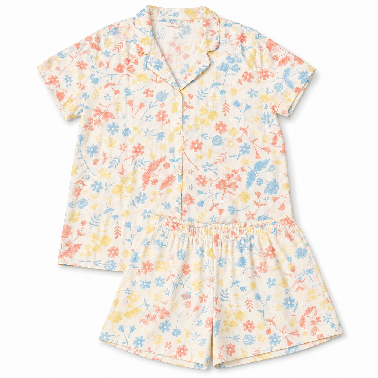 Floral patterned romper on a white background