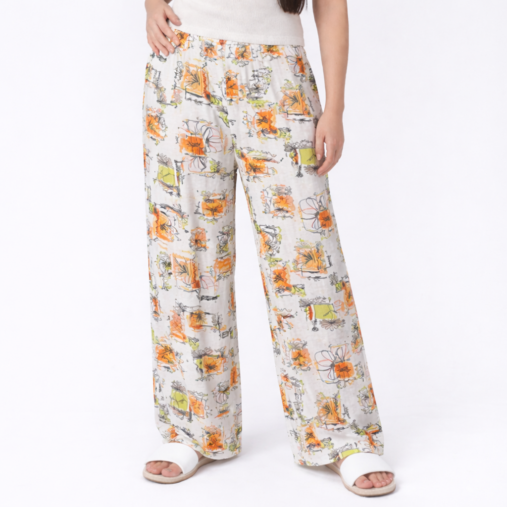 Woman wearing printed polyester pajama pants