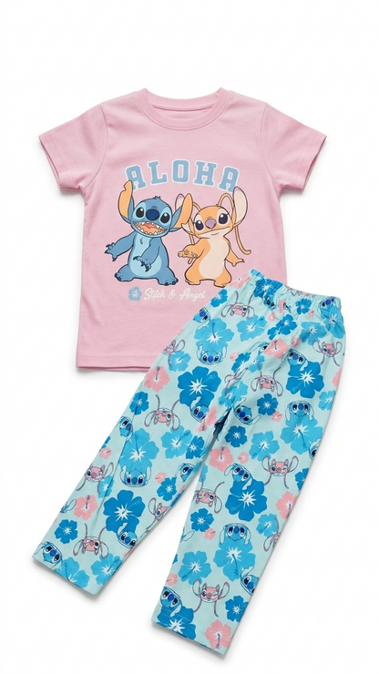 Children's pajama set with pink top and blue floral pants on a white background