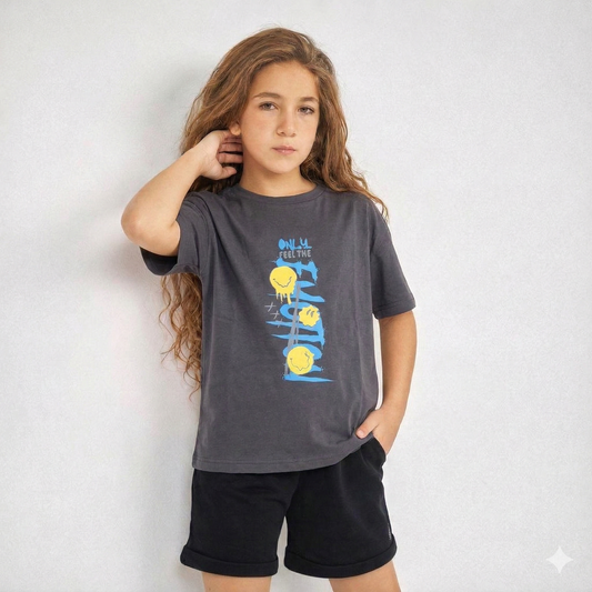 Person wearing a gray t-shirt with blue and yellow graphics on a white background