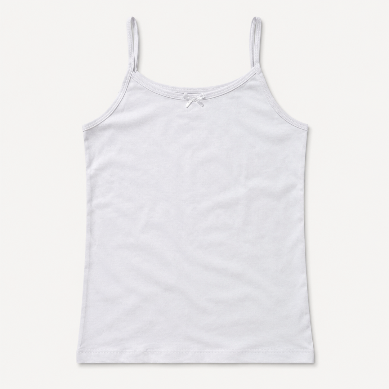 Girls plain white spaghetti strap camisole tank top flat lay