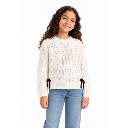 Girls' Pointelle Knit Pullover with Side Ties in Cream on a model