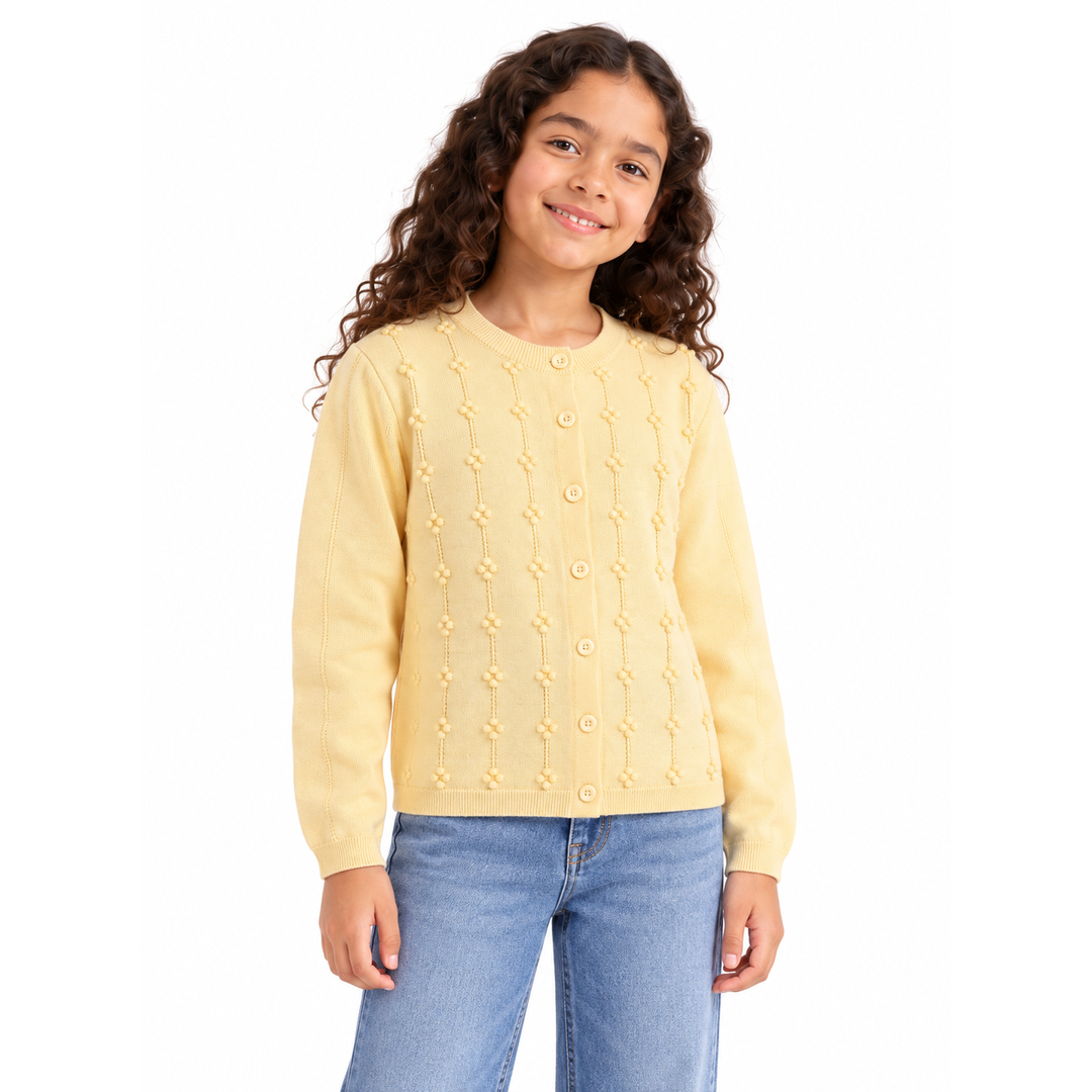 Girls' Pointelle Button Knit Cardigan in Yellow on a model