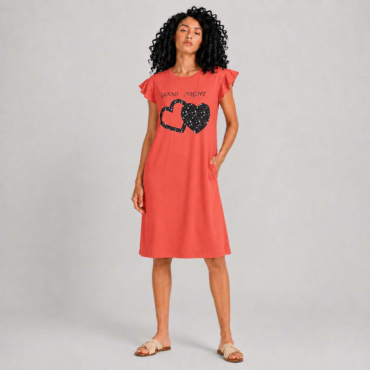 Women's orange Good Night heart print sleeping dress on model
